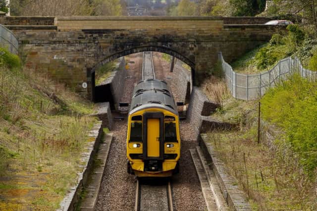 A train passes Eskbank on the Borders Railway in April 2018. The 30-mile route opened in 2015, and follows part of the orginal Waverley line which closed in 1969. Picture: Scott Louden