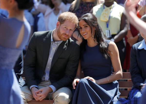 Prince Harry, Duke of Sussex and Meghan, Duchess of Sussex watch a performance. Picture: Phil Noble - Pool/Getty Images