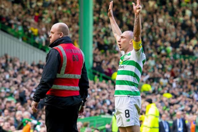 Scott Brown celebrates at full time as Celtic defeat Rangers 2-1 in the third Old Firm clash of the season. Picture: SNS Group