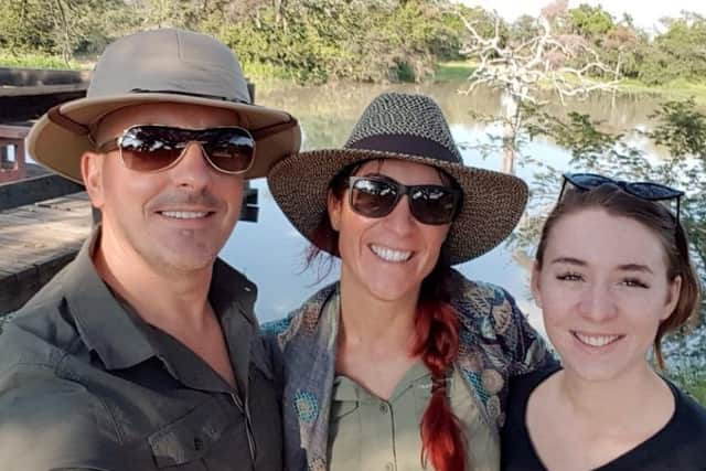 Megan Royle (right), with her mother Lindsey Mallon (centre), and step father Paul Kratovi. Picture: RSPCA/PA Wire