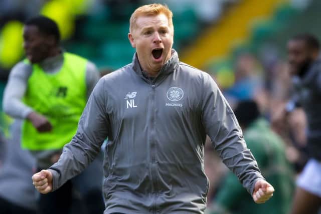 Neil Lennon celebrates James Forrest's 86th-minute winner for Celtic at Parkhead on Sunday.