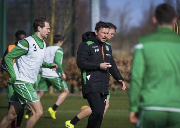 Paul Heckingbottom takes training at Hibs' training centre in Ormiston. Picture: SNS Group