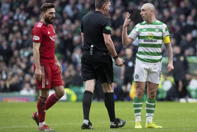Celtic's Scott Brown will come up against Aberdeen's Graeme Shinnie. Picture: SNS/Craig Foy