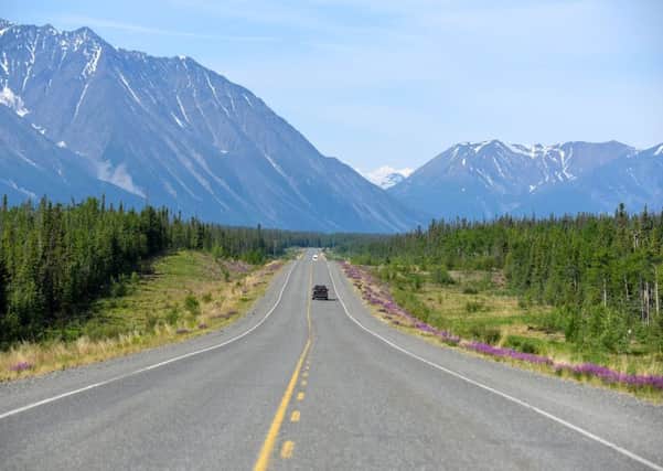 A stretch of the 1,387 mile Alaskan Highway, which runs through Yukon and joins the US to Canada's northernmost territory. Picture: Lisa Young