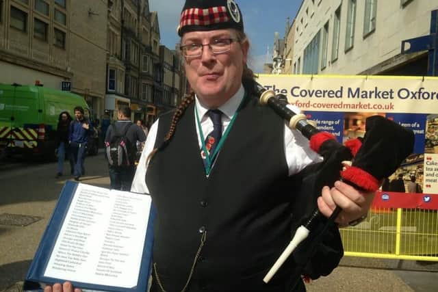 George Sinclair, 49, near one of his favourite busking spots