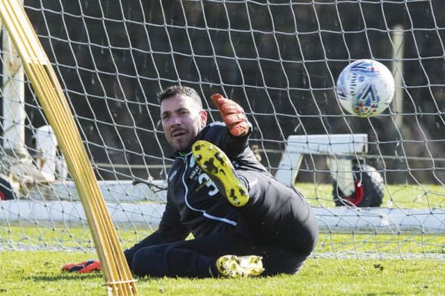 Now rejuvenated, Hibernian keeper Ofir Marciano admits that a long absence through injury pushed his patience to the limit. Picture: SNS.