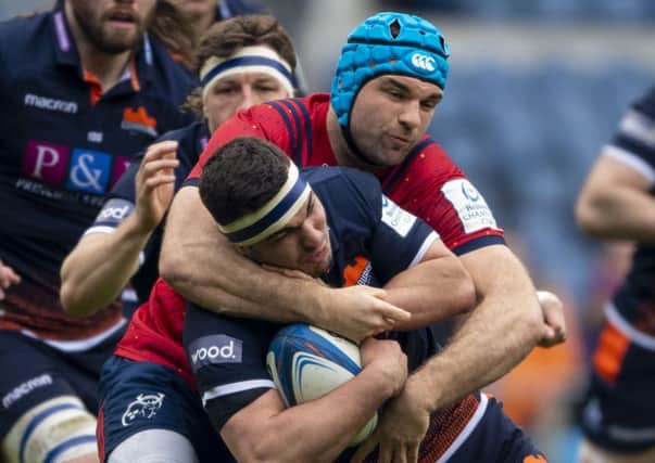Munster's Tadhg Beirne gets to grips with 
Edinburgh's Stuart McInally. Picture: Ross Parker/SNS