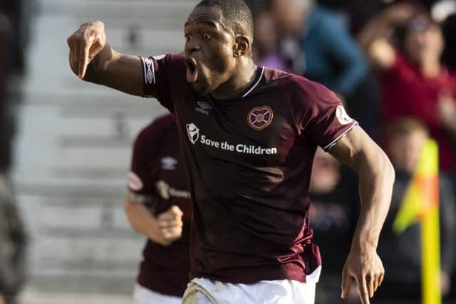 Uche Ikpeazu celebrates his goal against Aberdeen: Picture: SNS