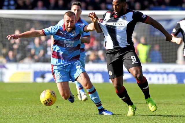 Dundee's James Horsfield, left, battles with St Mirren's Duckens Nazon. Picture: Alan Harvey/SNS