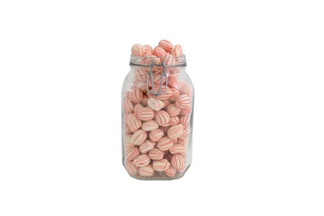These cockle shaped sweets were hard boiled, striped and tasted strongly of mint.
