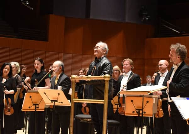Film composer Paul Chihara takes a bow after his specially commissioned A Matter of Honour, for narrator and orchestra, was performed by veteran actor Clyde Kusatsu and the RSNO at Soka University in Orange County, California.