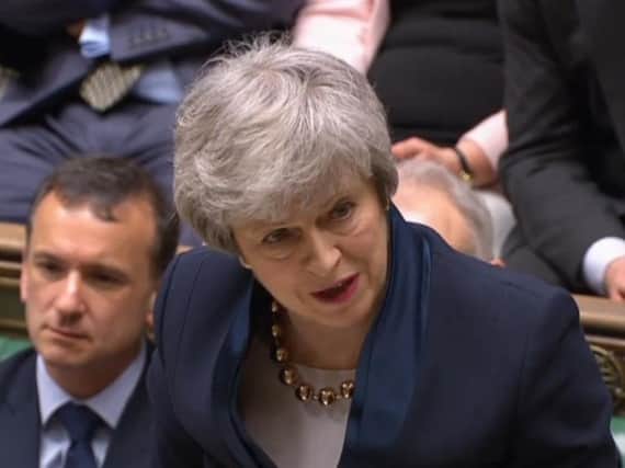 Prime Minister Theresa May came under fire at PMQs from her own MPs over her decision to hold Brexit talks with Labour