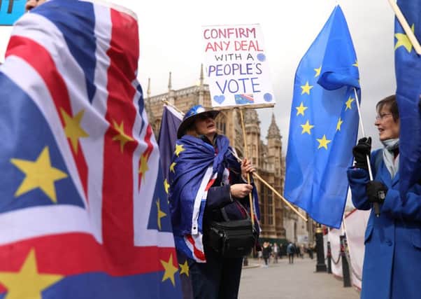 There is a steady stream of protestors on both sides outside Parliament. Picture: AFP/Getty
