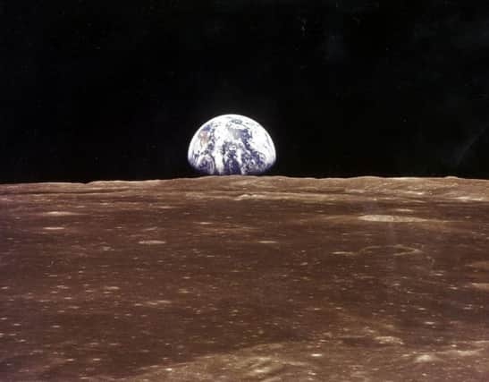 This 19 July 1969 file photo released by NASA shows the Earth as seen from the Apollo 11 command module as it orbits the Moon during before the landing of the lunar module. Picture: NASA/AFP/Getty Images