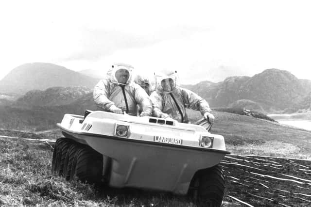 Government scientists from Porton Down Research Establishment on Gruinard for decontamination works in 1986. It was declared safe four years later. PIC: TSPL.