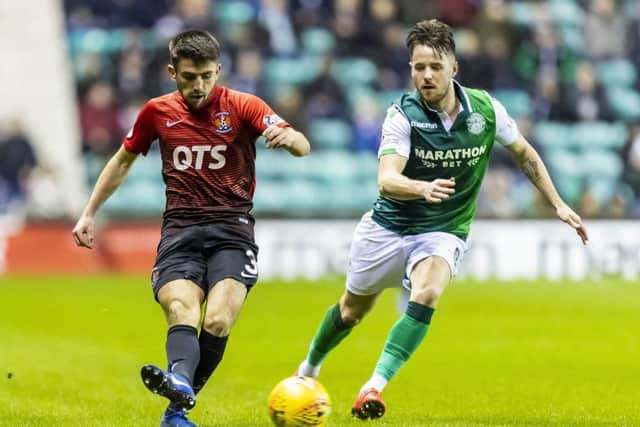 Kilmarnock's Greg Taylor is closed down by Marc McNulty. Picture: SNS Group
