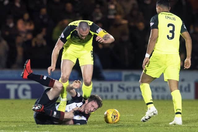 Scott Brown clashes with Jim Kellerman - but Neil Lennon defended his captain. Picture: SNS Group
