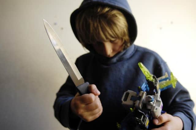 Youth knife crime caused concerns about raising age of criminal responsibility to 16. Picture (posed by model): Phil Wilkinson