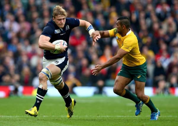 David Denton takes on Kurtley Beale of Australia during the 2015 Rugby World Cup quarter-final at Twickenham. Picture: Paul Gilham/Getty Images
