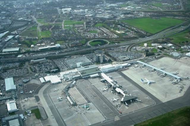 Vast swathes of land around Glasgow Airport, which is used for car parking and storage, are registered to overseas owners. PIC: Creative Commons/Jim Smillie.
