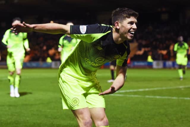 Ryan Christie takes a bow in front of the away fans after sealing Celtic's 2-0 win against St Mirren in Paisley. Picture: Craig Foy/SNS