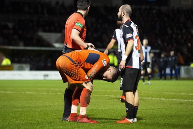 St Mirren's Vaclav Hladky was hurt after a firework was thrown near the goalkeeper during Wednesday night's match. Picture: SNS