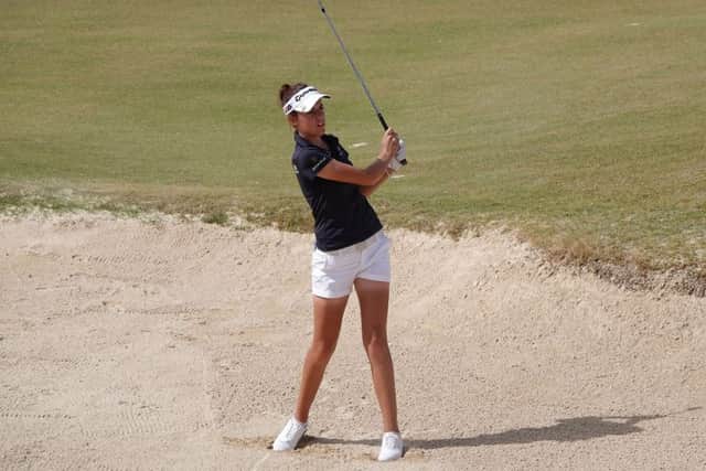 Meghan MacLaren plays out of a bunker during the first round of the Jordan Mixed Open. Picture: Phil Inglis/Getty