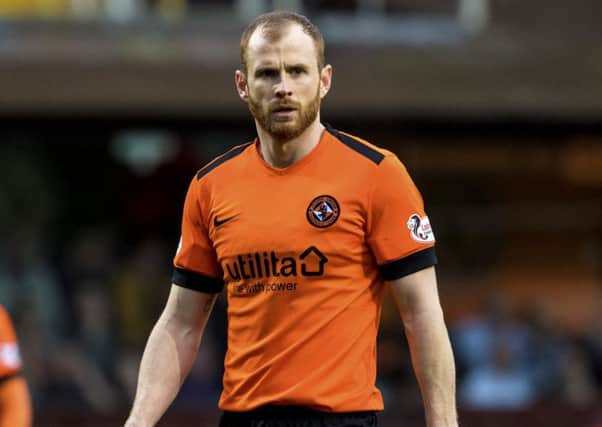 Mark Reynolds insists Dundee United cannot rely on Ross County slipping up in the race for top spot. Picture: SNS.