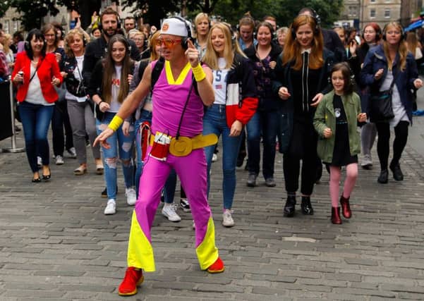 Theresa May's latest outfit may be a bit garish but at least it encourages people to follow her