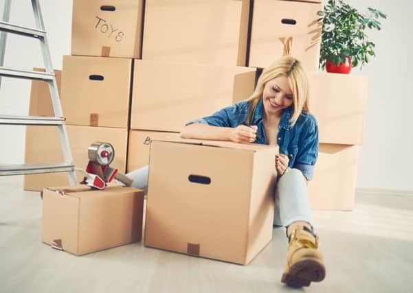 You can cut costs by roping in family or friends to help with packing for the move. Picture: PA