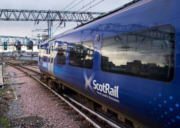 A ScotRail train in motion. Picture: John Devlin