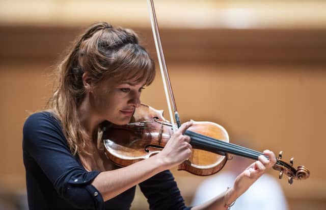 Scottish violinist Nicola Benedetti enjoyed a close and intimate rapport with the orchestra.. Picture: John Devlin