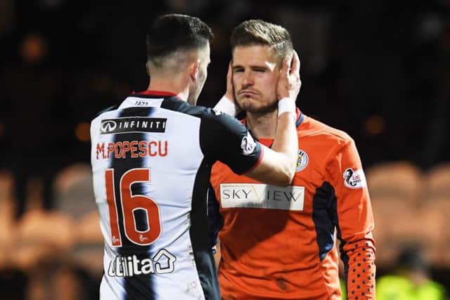 St Mirren goalkeeper Vaclav Hladky was dazed after a flashbang exploded next to him during Wednesdays match against Celtic. Picture: SNS.