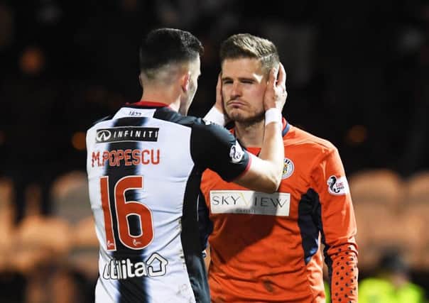 St Mirren goalkeeper Vaclav Hladky was dazed after a flashbang exploded next to him during Wednesdays match against Celtic. Picture: SNS.