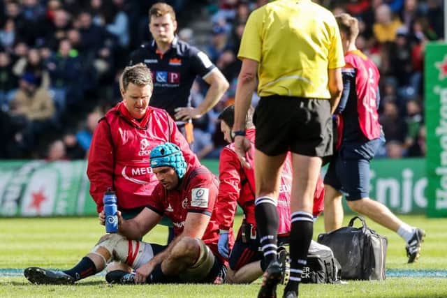 Munster's Tadhg Beirne receives treatment
during the Heineken Champions Cup quarter-final against Edinburgh. Picture: Gary Carr/INPHO/REX/Shutterstock