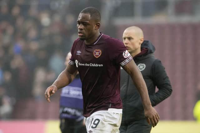 A dejected Uche Ikpeazu walks off the pitch at full-time in Saturday's Edinburgh derby. Picture: SNS