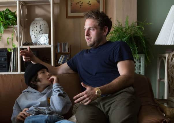 Pictured: (L-R) Sunny Suljic as Stevie and director Jonah Hill. Picture: PA Photo/Altitude Films/Tobin Yelland
