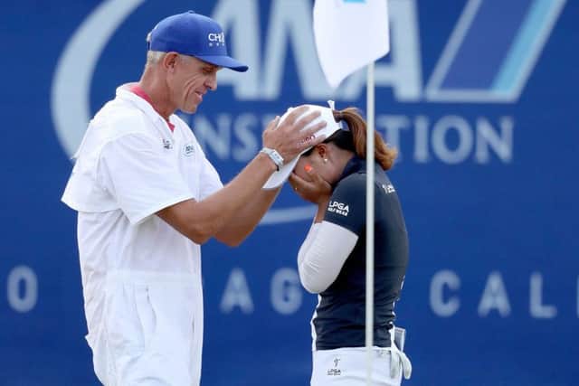 Jin Young Ko of Korea is congratulated by her caddie David Brooker after holing out to win the ANA Inspiration. Picture: Matthew Stockman/Getty