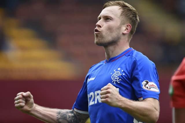 Scott Arfield celebrates completing his hat-trick against Motherwell. Picture: SNS Group