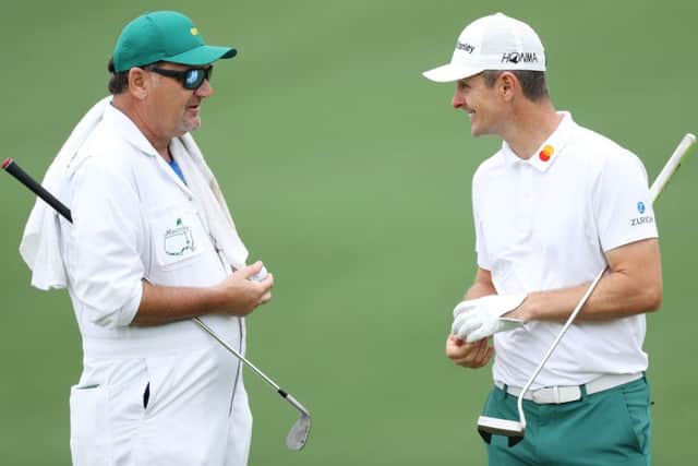 Justin Rose and caddie Mark 'Fooch' Fulcher are resuming their productive partnership at Augusta. Picture: David Cannon/Getty Images