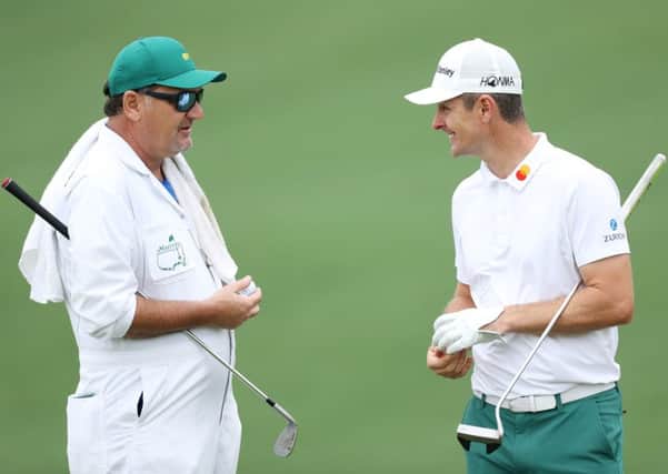 Justin Rose and caddie Mark 'Fooch' Fulcher are resuming their productive partnership at Augusta. Picture: David Cannon/Getty Images