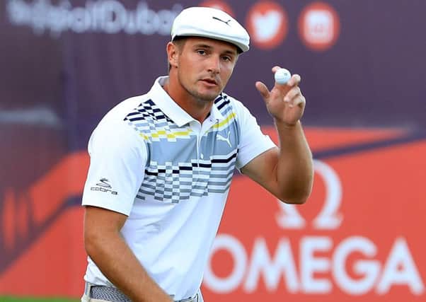 Bryson DeChambeau acknowledges the crowd at the Omega Dubai Desert Classic. Picture: Andrew Redington/Getty Images