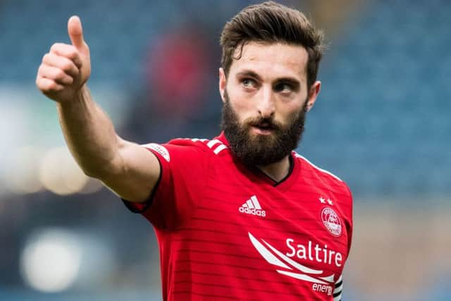 Graeme Shinnie will sit out the semi-final through suspension but has backed his team-mates to do the business. Picture: SNS Group