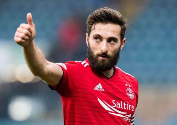 Graeme Shinnie will sit out the semi-final through suspension but has backed his team-mates to do the business. Picture: SNS Group