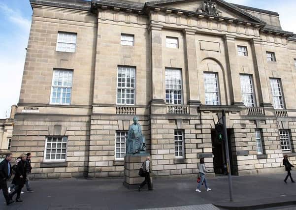 The juror collapsed in the High Court of Edinburgh. Picture: TSPL