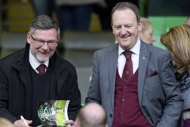 Scot Gardiner (right) with Hearts boss Craig Levein. Picture: SNS Group