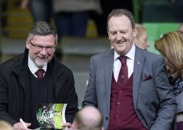 Scot Gardiner (right) with Hearts boss Craig Levein. Picture: SNS Group