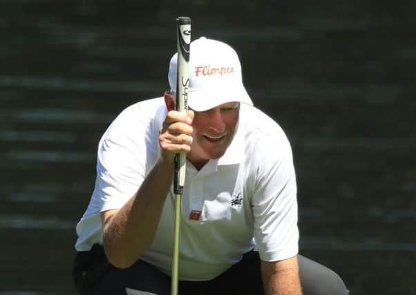 Sandy Lyle lines up a putt on his way to a five-under total in the Par 3 event at Augusta National. Picture: Getty Images