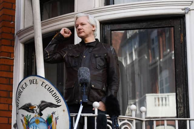 May 19, 2017 - Wikileaks founder Julian Assange speaks on the balcony of the Embassy of Ecuador in London. (Photo by Justin TALLIS / AFP)JUSTIN TALLIS/AFP/Getty Images