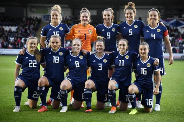 The Scotland team featuring, back row (left to right), Sophie Howard, Lee Alexander, Caroline Weir, Jennifer Beattie, Rachel Corsie, and front row (left to right), Erin Cuthbert, Claire Emslie, Kim Little, Emma Mitchell, Lisa Evans, Christie Murray. Picture: Rob Casey/SNS